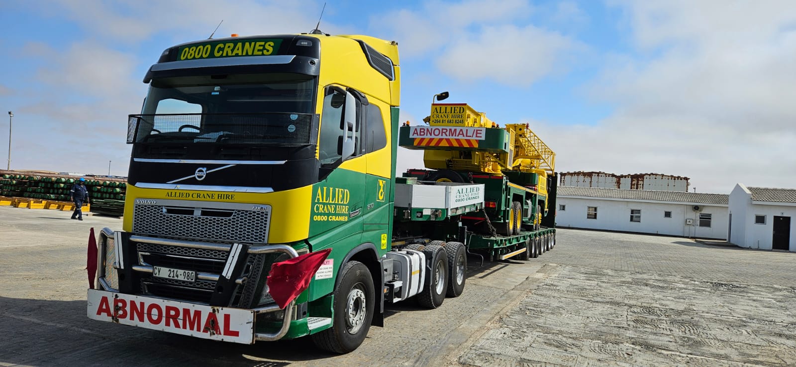 Allied Volvo truck hauling a crane as an abnormal load